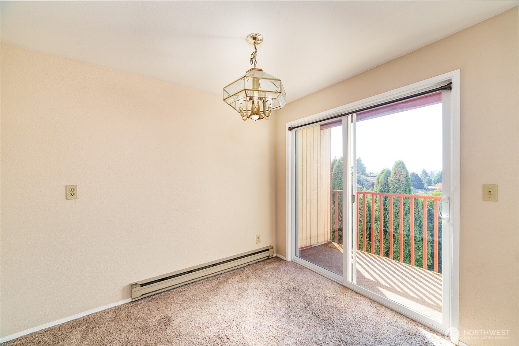 221 Southwest 154th Street, Unit 8 Burien, WA 98166 - Photo 5 of 10 a view of a hallway with a window