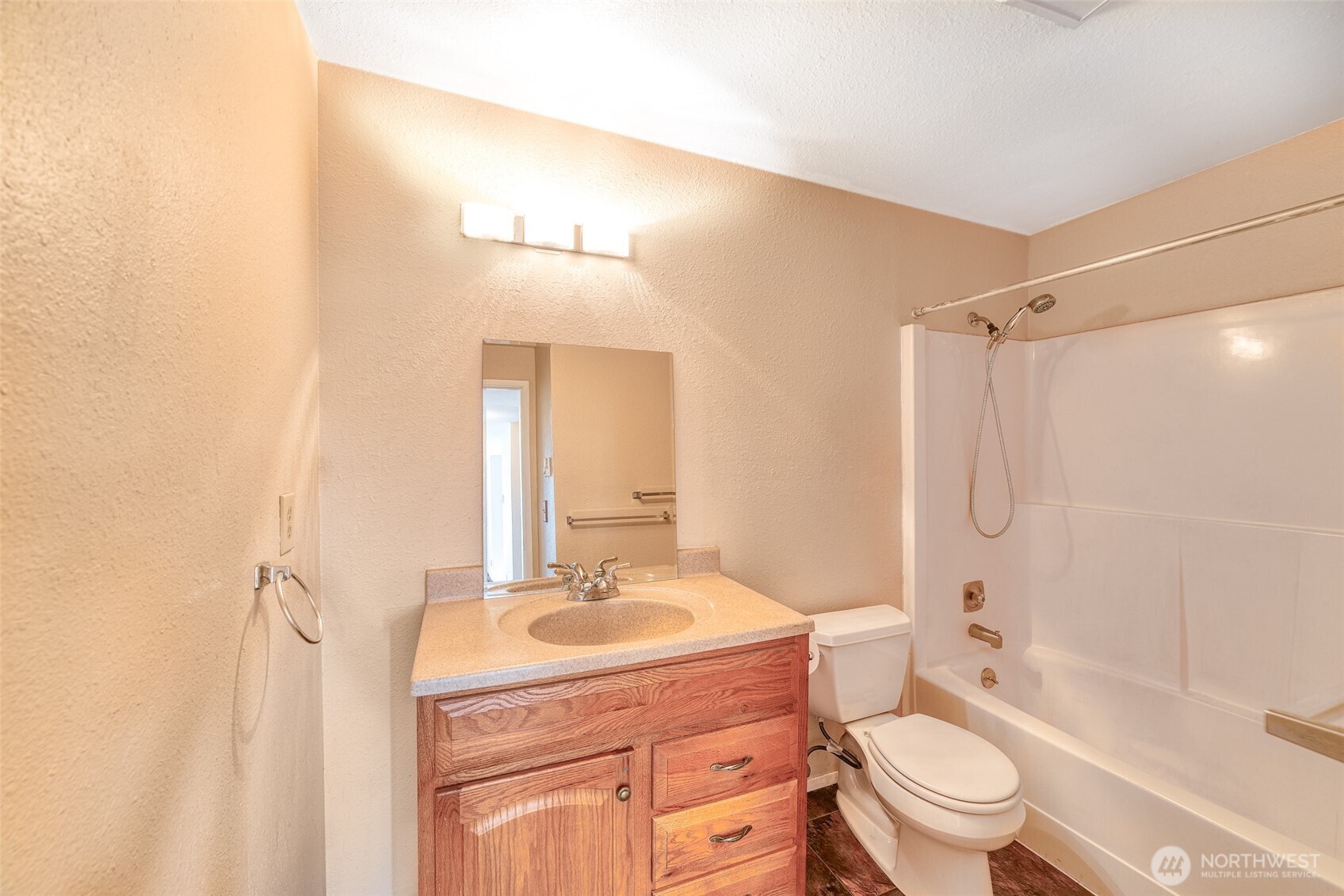 221 Southwest 154th Street, Unit 8 Burien, WA 98166 - Photo 10 of 10 a bathroom with a sink toilet tub and shower