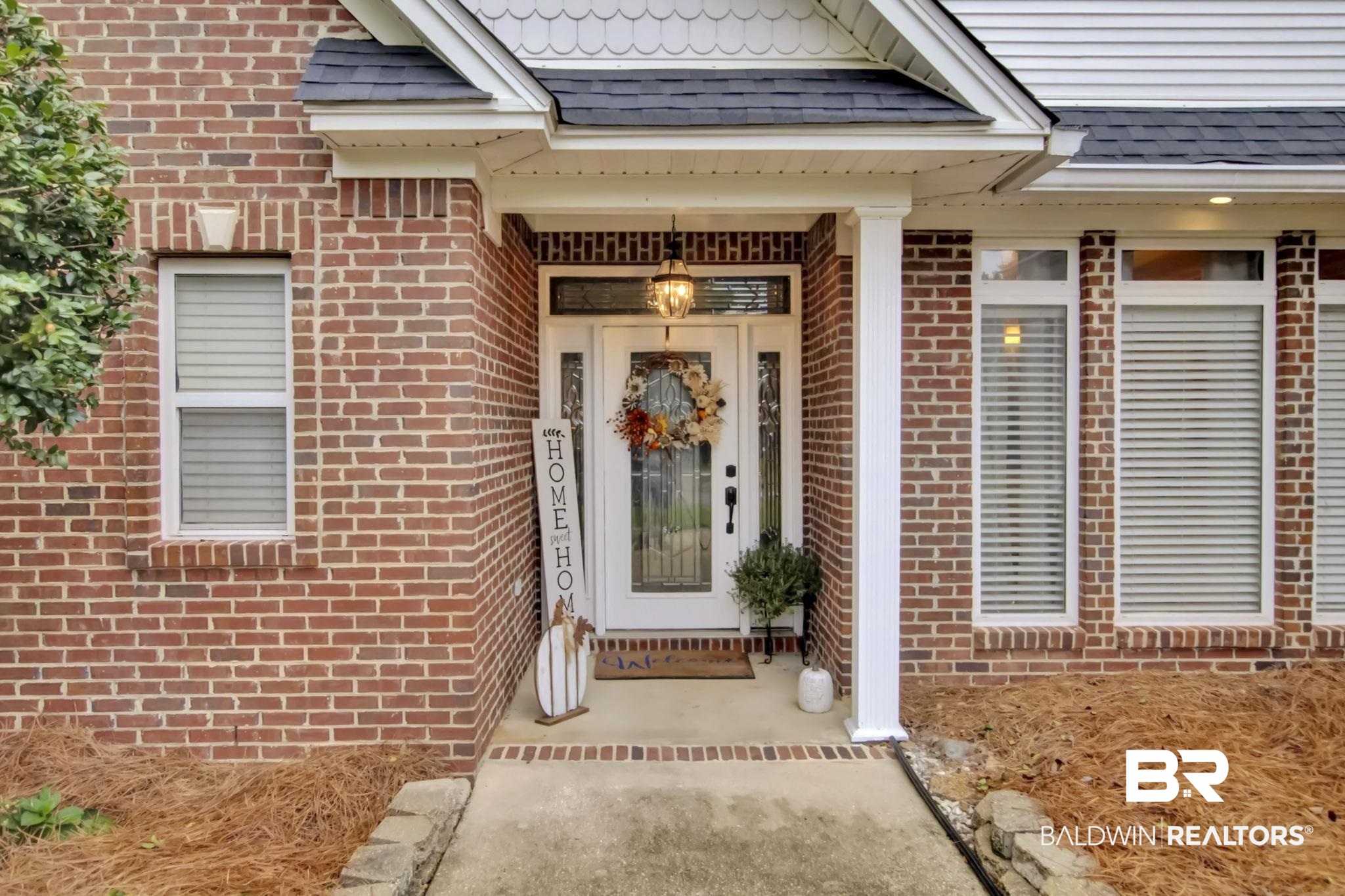 9002 Parliament Circle Daphne, AL 36526 - Photo 6 of 73 Property entrance featuring covered porch