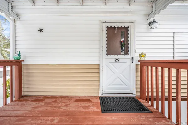 a view of a door and a window