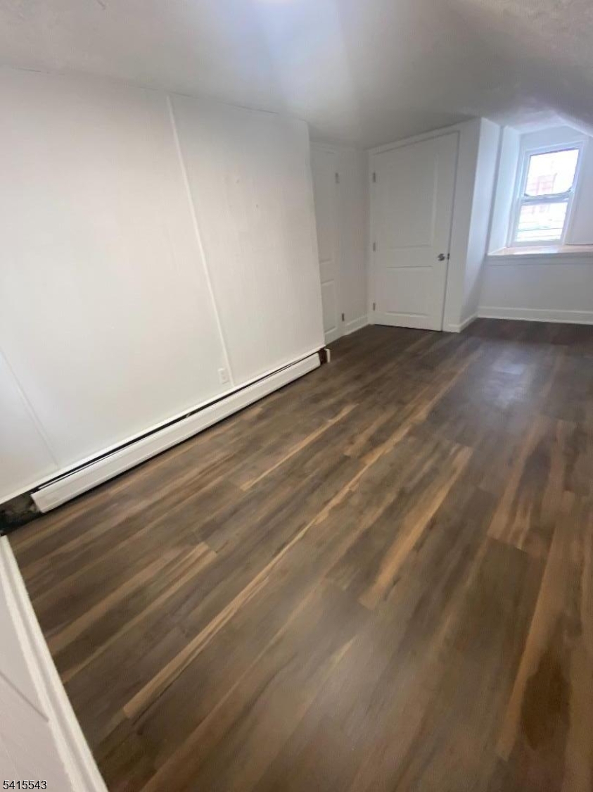 61 Highland Street Paterson, NJ 07524 - Photo 2 of 13 a view of an empty room