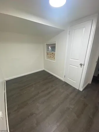 an empty room with a bench