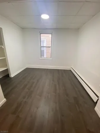 an empty room with a bench