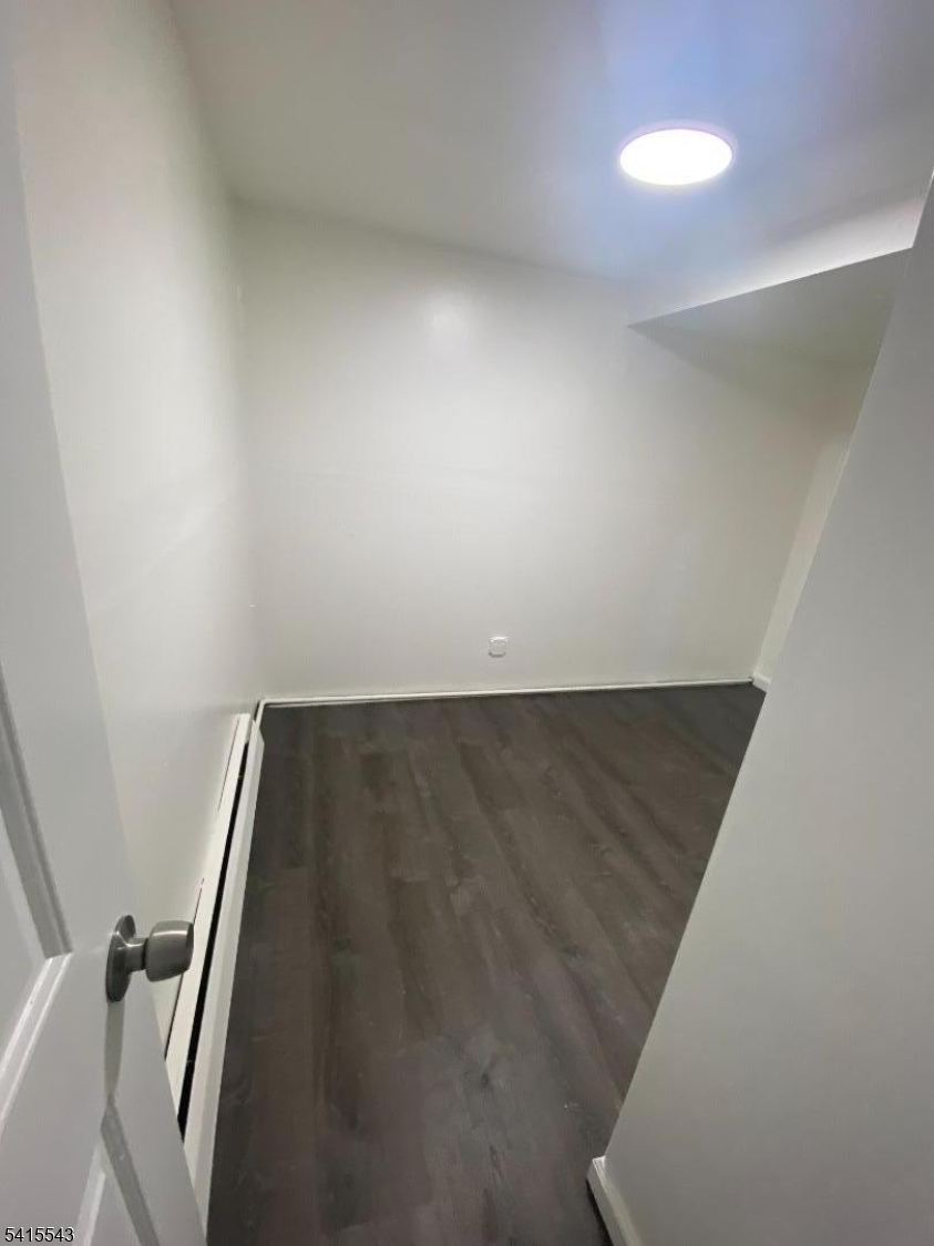 61 Highland Street Paterson, NJ 07524 - Photo 5 of 13 a view of wooden floor