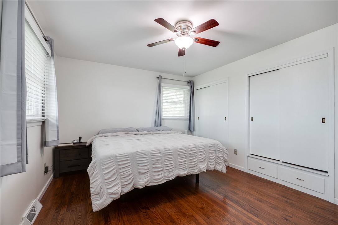 6950 Red Lion 5 Points Road Springboro, OH 45066 - Photo 29 of 78 This spacious room features rich wood flooring and ample storage with built-in closet space.