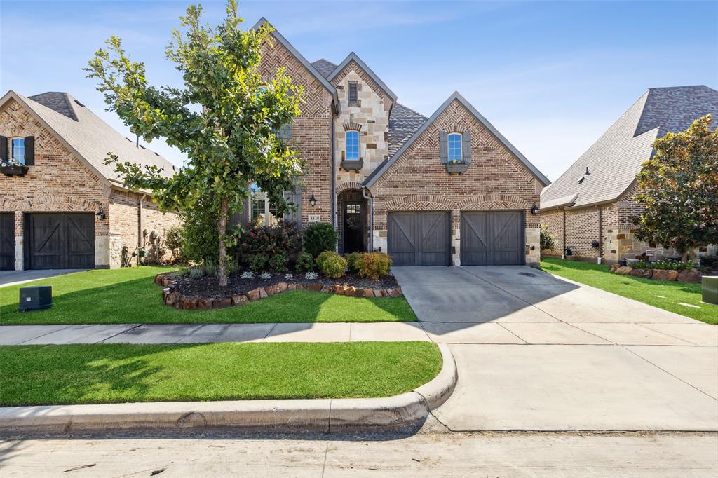 8349 Burnley The Colony, TX 75056 - Photo 1 of 1 a front view of a house with a yard
