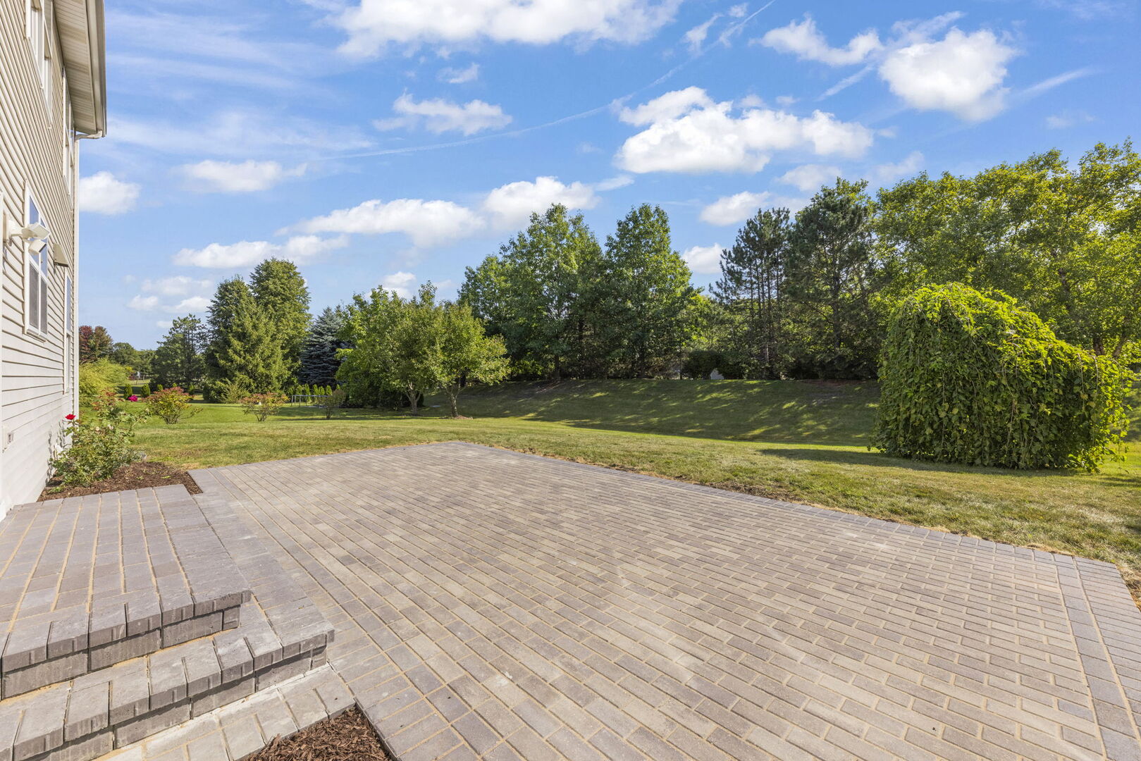 5 Player Court Bolingbrook, IL 60490 - Photo 28 of 37 a view of a swimming pool with a yard