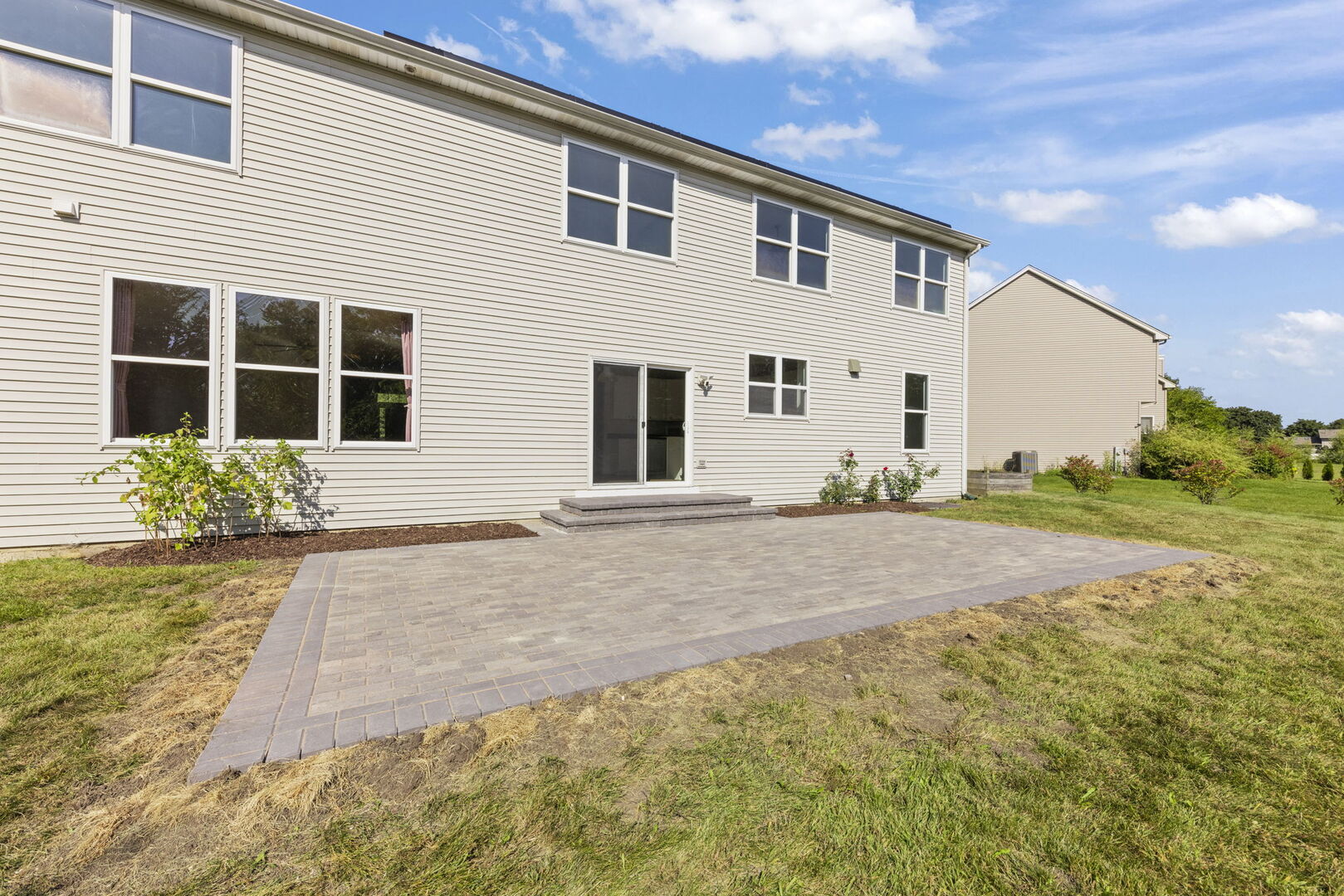 5 Player Court Bolingbrook, IL 60490 - Photo 29 of 37 a front view of a house with a yard and garage