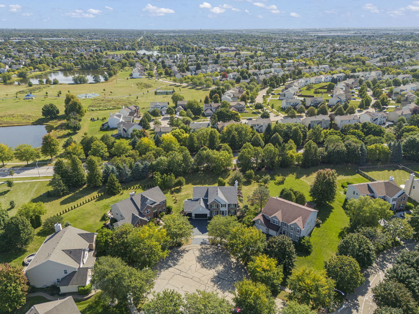 5 Player Court Bolingbrook, IL 60490 - Photo 34 of 37 an aerial view of a house with a lake view