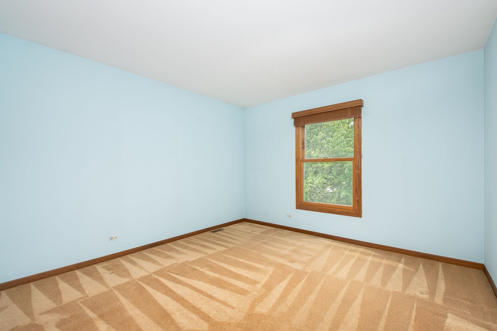 466 River Front Circle Naperville, IL 60540 - Photo 14 of 17 an empty room with a window