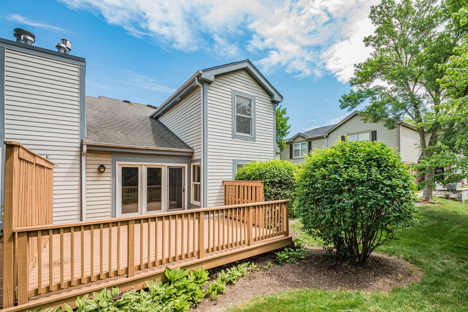 466 River Front Circle Naperville, IL 60540 - Photo 17 of 17 a view of a house with a yard