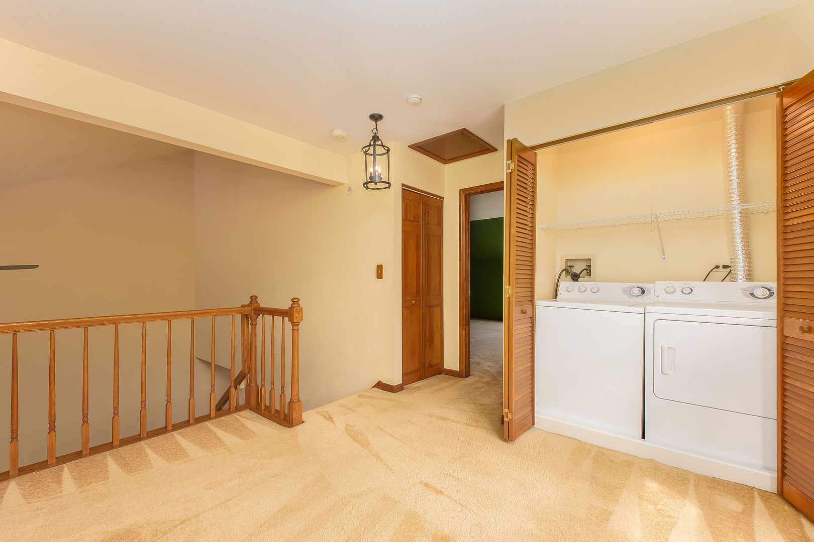 466 River Front Circle Naperville, IL 60540 - Photo 9 of 17 a view of a walk in closet and bedroom