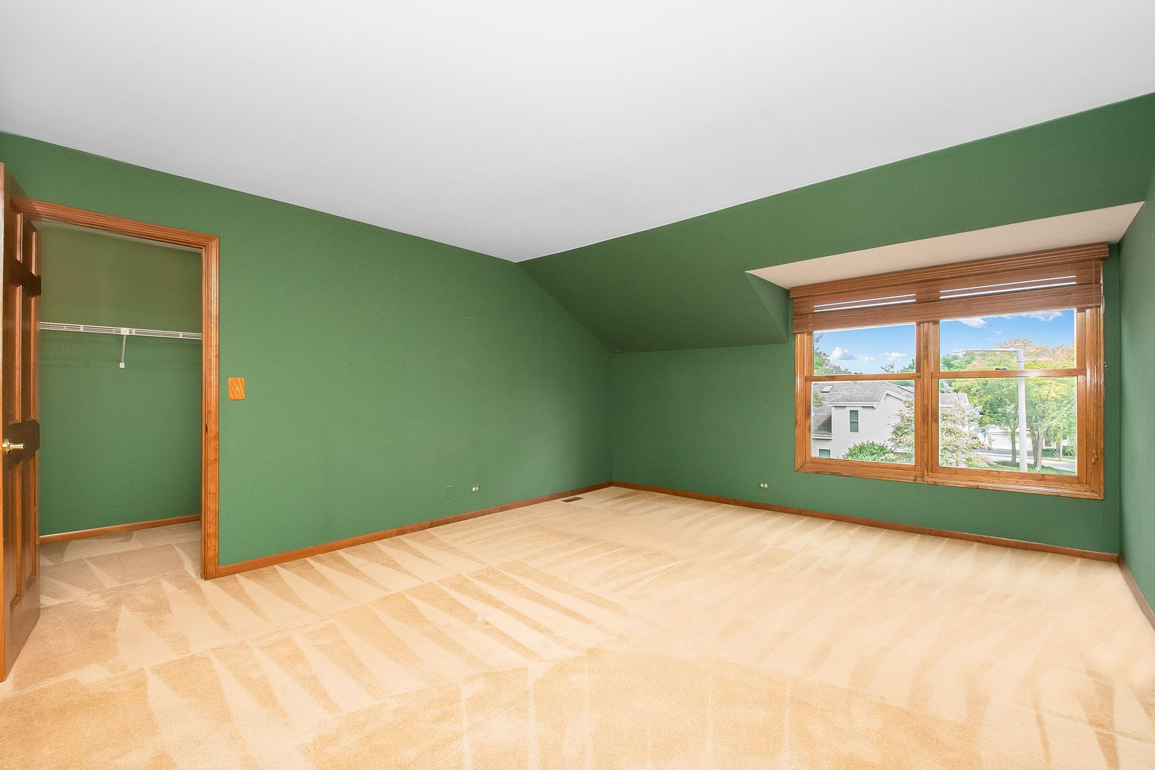 466 River Front Circle Naperville, IL 60540 - Photo 10 of 17 a bedroom with a bed and a large window