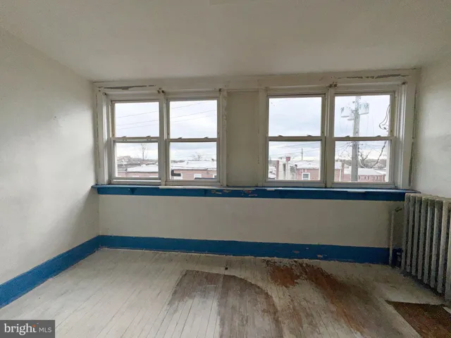 a view of empty room with a window