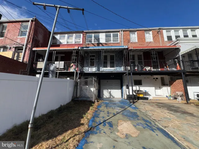 a view of a cafe with sitting area
