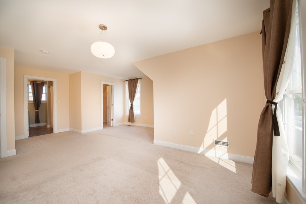 97 Boardman Street, Unit 97 Boston, MA 02128 - Photo 13 of 18 a view of a living room with windows