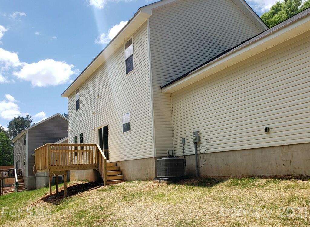 1806 Love Road Monroe, NC 28110 - Photo 14 of 20 a front view of a house with a yard