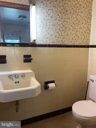 a bathroom with a sink and a toilet