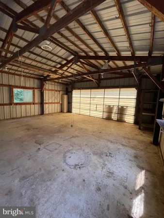 a view of an empty room with storage