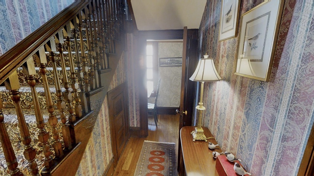 35 Renwick Road Melrose, MA 02176 - Photo 11 of 27 a view of walk in closet with clothes and shoes