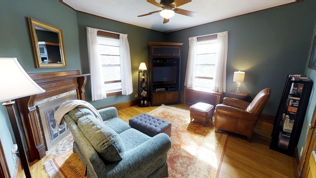 35 Renwick Road Melrose, MA 02176 - Photo 13 of 27 a living room with furniture and a large window