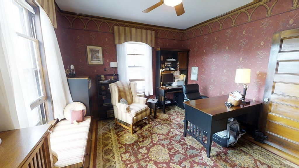 35 Renwick Road Melrose, MA 02176 - Photo 14 of 27 a living room with furniture a table and large windows