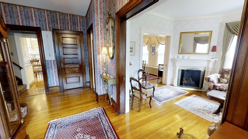 35 Renwick Road Melrose, MA 02176 - Photo 4 of 27 a living room with furniture and a fireplace