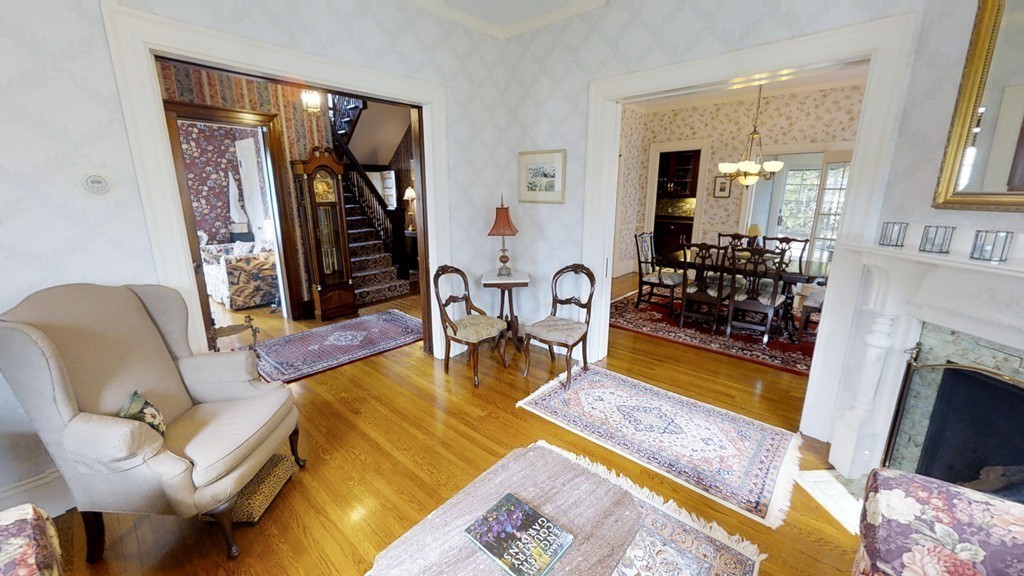 35 Renwick Road Melrose, MA 02176 - Photo 5 of 27 a living room with fireplace furniture and a rug