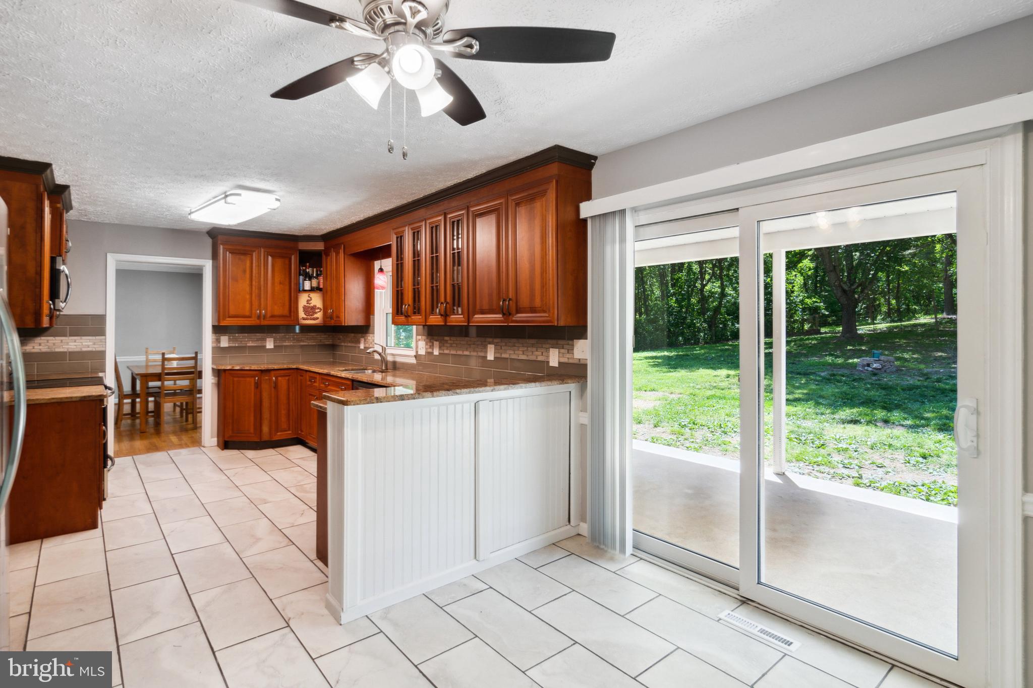 4412 Reels Mill Road Frederick, MD 21704 - Photo 13 of 37 Exit to patio from breakfast room