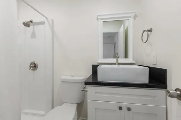 a kitchen with stainless steel appliances a refrigerator and a sink