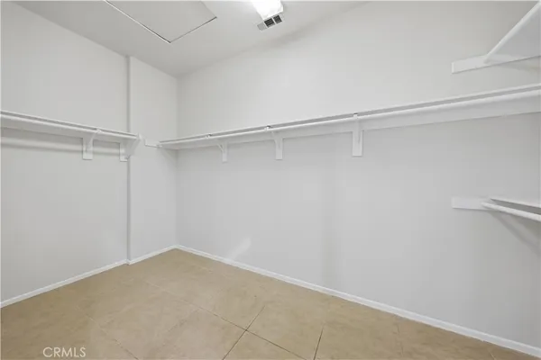 a view of an empty walk in closet