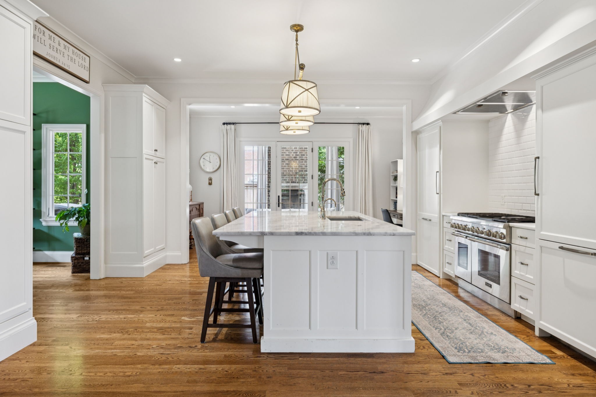 2401 Sterling Road Nashville, TN 37215 - Photo 41 of 92 a very nice looking kitchen with granite countertop a stove oven and white cabinets
