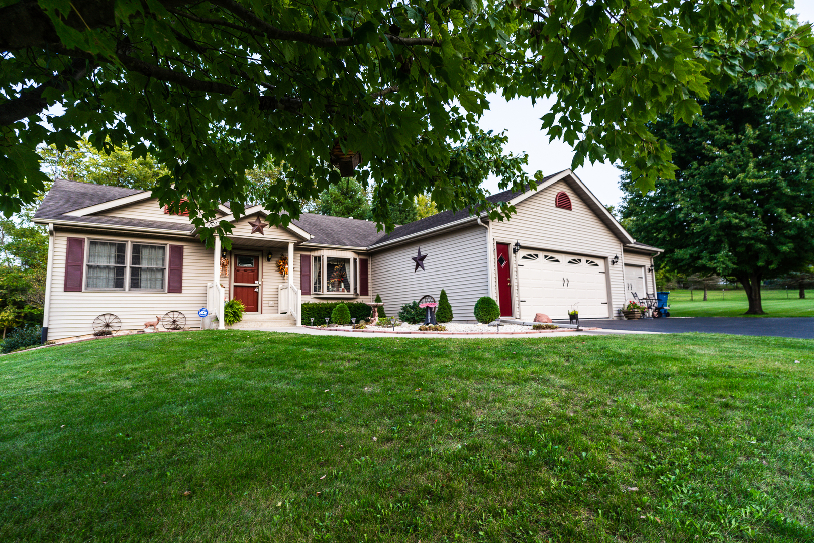 2018 Grand Detour Road Dixon, IL 61021 - Photo 1 of 25 a front view of a house with a yard porch and tree