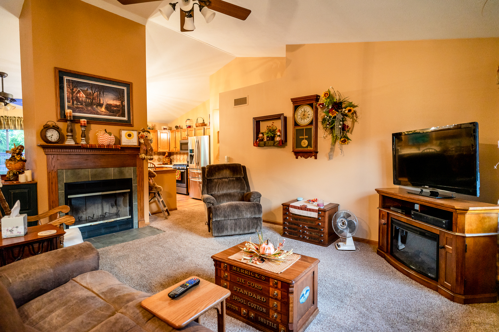 2018 Grand Detour Road Dixon, IL 61021 - Photo 3 of 25 a living room with furniture a flat screen tv and kitchen view