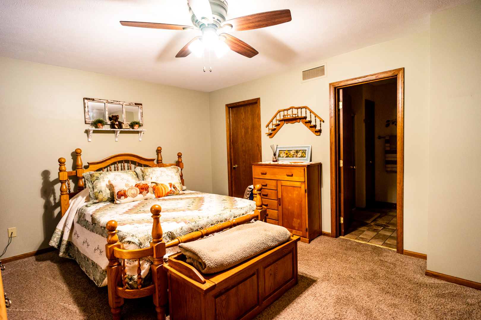 2018 Grand Detour Road Dixon, IL 61021 - Photo 6 of 25 a bedroom with a bed and a chandelier