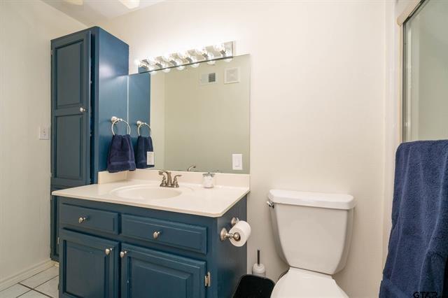 431 Gifford Street Rusk, TX 75785 - Photo 24 of 40 a bathroom with a sink toilet and shower