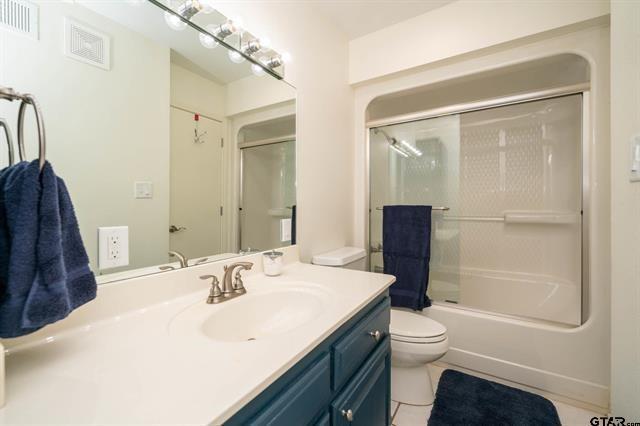431 Gifford Street Rusk, TX 75785 - Photo 25 of 40 a bathroom with a sink a toilet and shower