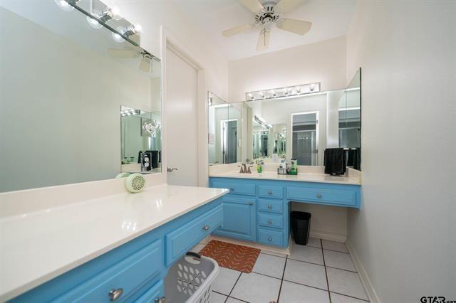 431 Gifford Street Rusk, TX 75785 - Photo 30 of 40 a bathroom with a sink and a mirror