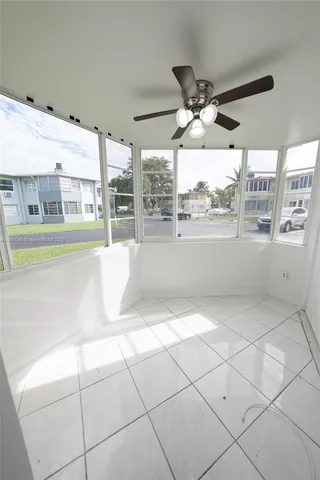 a living room with a large window