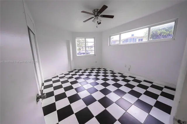 a black and white checkered floor with a black white checkered floor