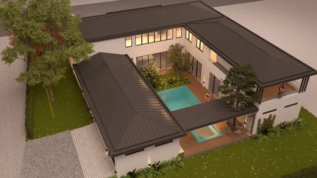 a view of a backyard with sitting area