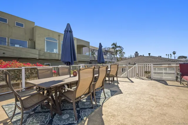 a view of a chairs and table in the terrace