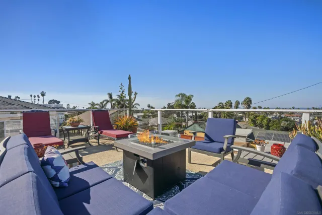 a view of a terrace with furniture