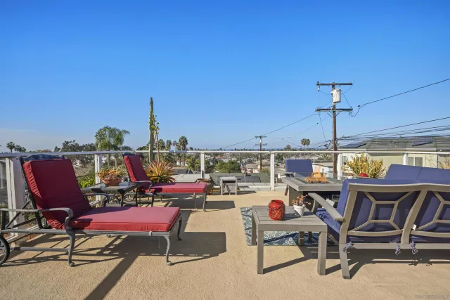 a view of a terrace with seating area