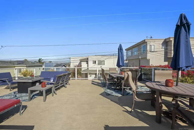 a view of a tables and chairs in patio