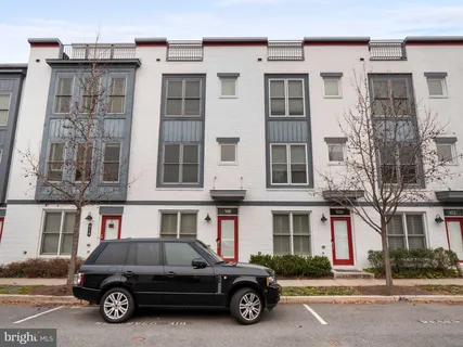 a car parked in front of a building