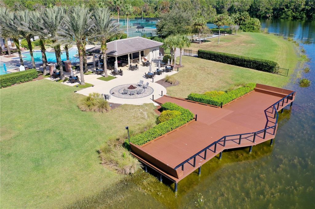 426 Long Cove Road Ormond Beach, FL 32174 - Photo 40 of 73 an aerial view of a house with swimming pool garden and patio