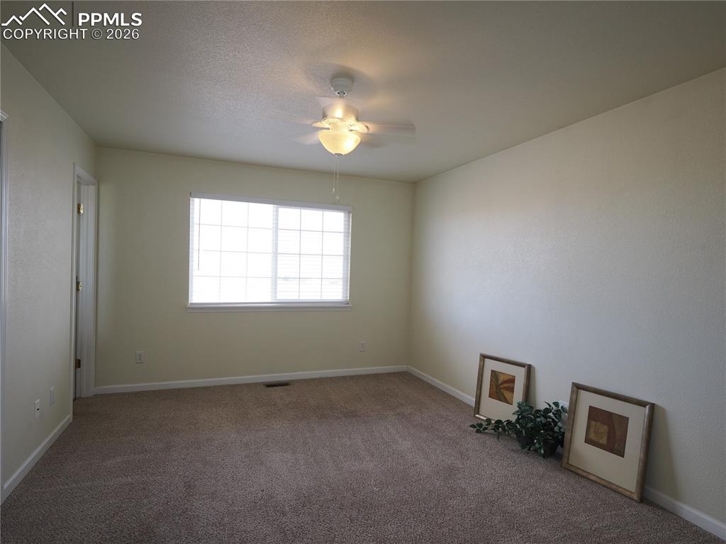 7338 Theresa Road Colorado Springs, CO 80925 - Photo 24 of 34 Primary bedroom