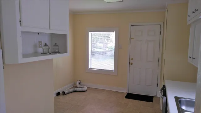 an empty room with cabinet