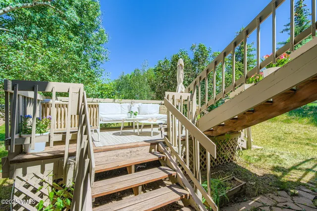 a view of a balcony with chairs